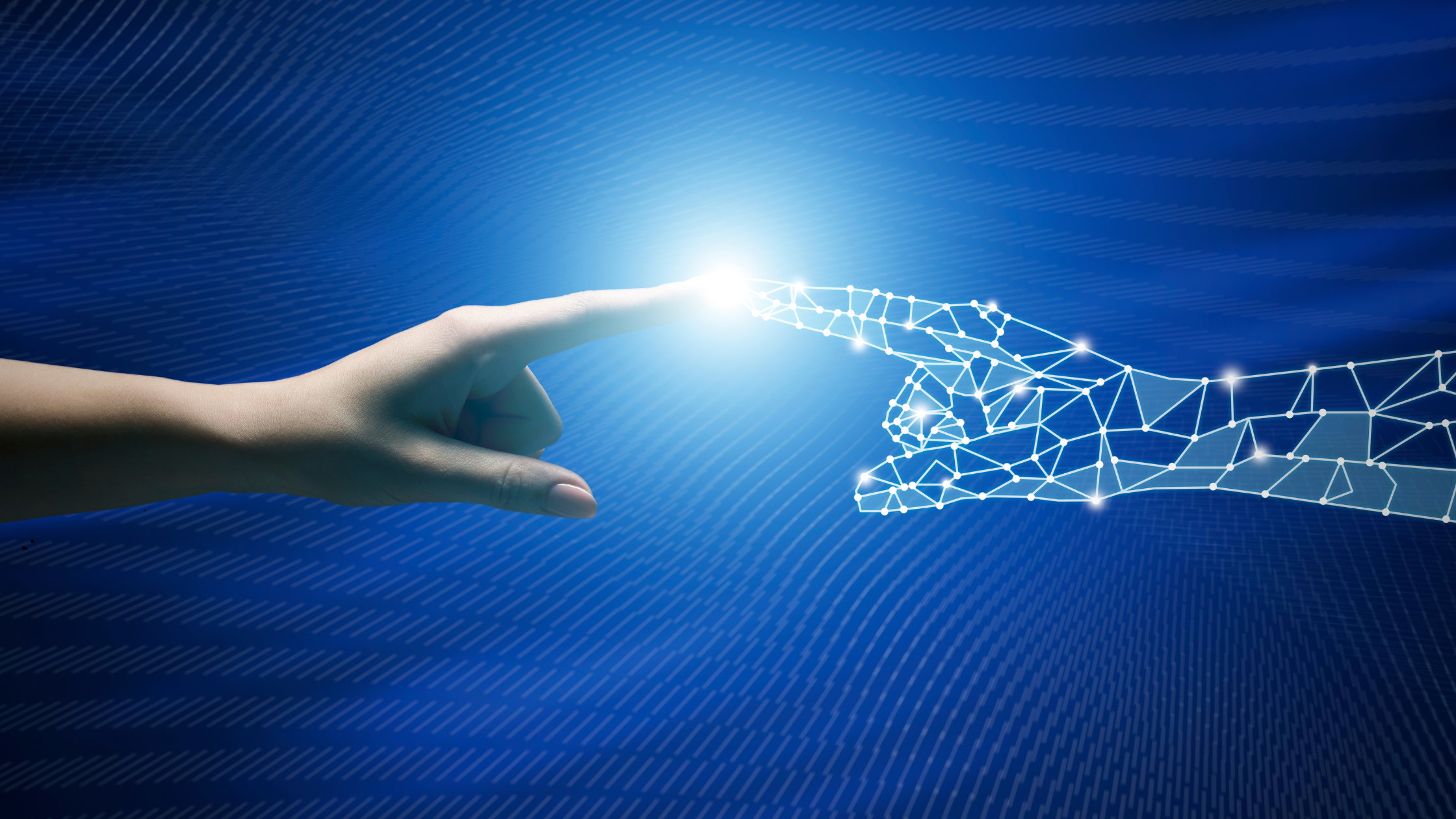 two hands touching index fingers. One human and one a representation using blue computer connections