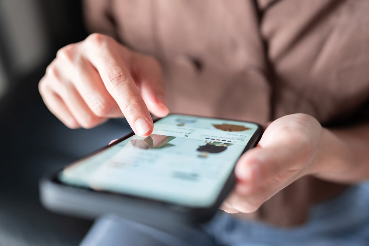 person on ecommerce website on their phone