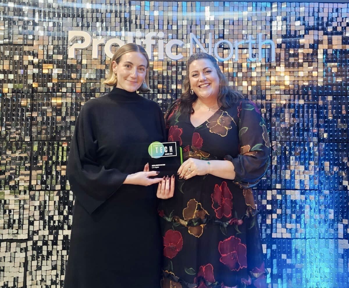 General Manager Katie Livingstone and Client Services Director Katie Pointon collecting the Prolific North Tech award for Digital Agency of the Year 2026