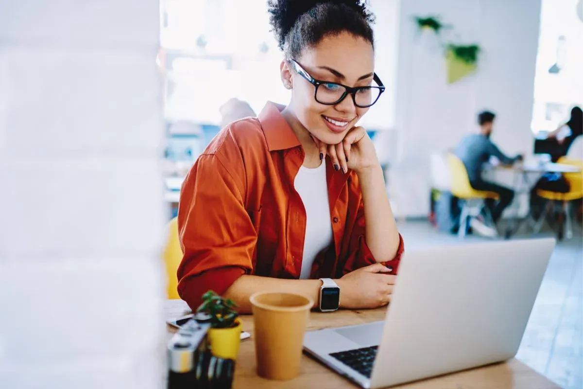 Person smiling and working